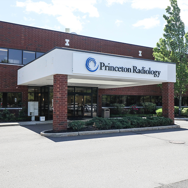 exterior view of the princeton radiology building with brick facade and white awning on a sunny day